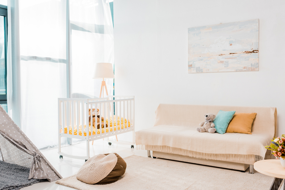 Nursery with modern art on the wall