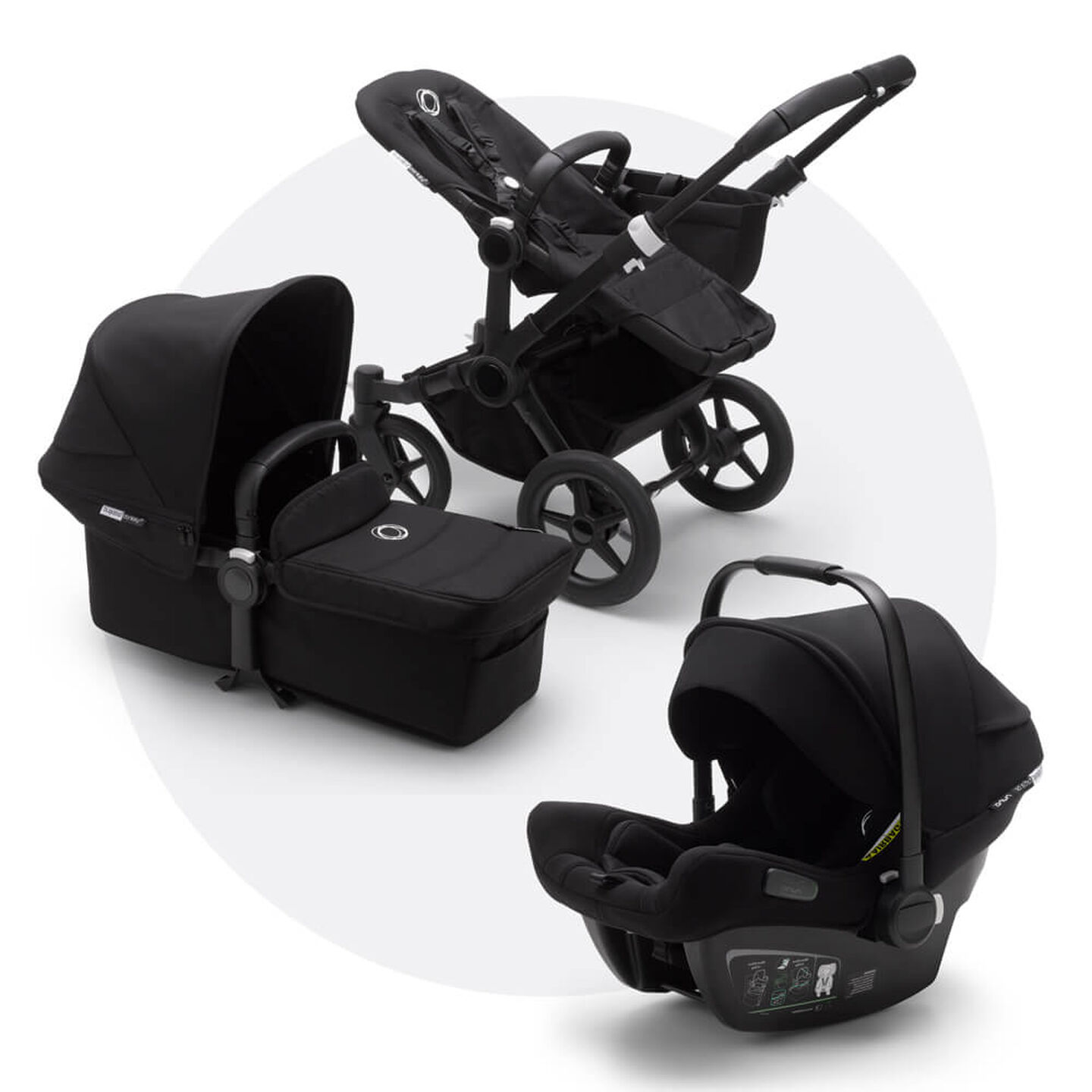 The Bugaboo Fox travel system in black, featuring a pushchair, carrycot and car seat