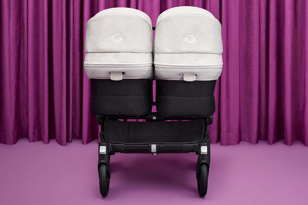 Twin stroller with underseat basket